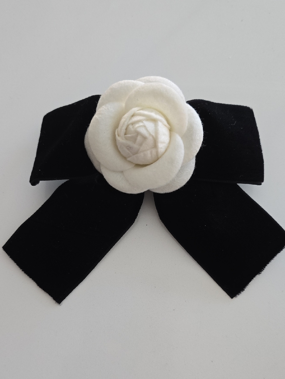 Black Velvet Bow with White Camellia Flower Hair Accessory